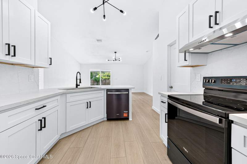 4 bedroom Single Family Residence at 711 Avalon Street, Port Malabar Unit 11, Palm Bay — photo 4