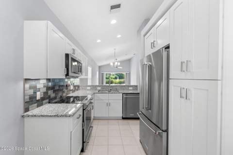 761 E Plantation Drive, Titusville FL - photo 9 of 44