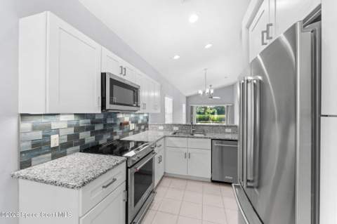 761 E Plantation Drive, Titusville FL - photo 10 of 44