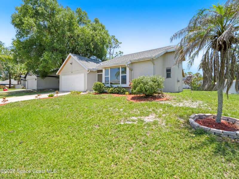 3 bedroom Single Family Residence at 648 Munich Street, Port Malabar Unit 48, Palm Bay — photo 1