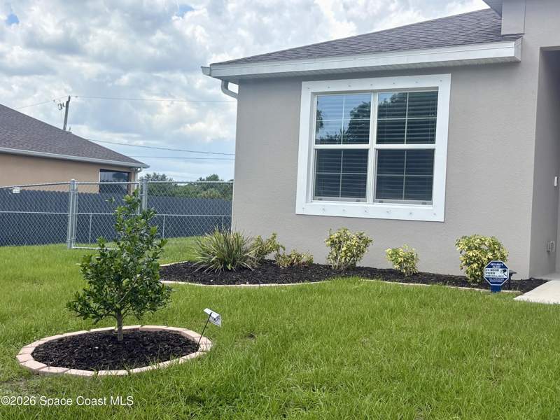 4 bedroom Single Family Residence at 859 Serenade Street, Port Malabar Unit 14, Palm Bay — photo 4