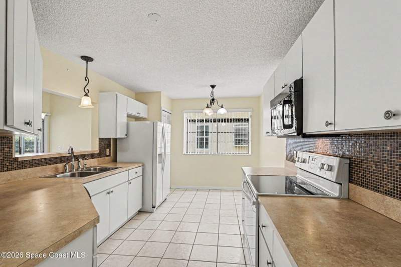 3 bedroom Townhouse at 745 Pine Island Drive, Courtyards Suntree Pud Stage 5 Tr 62 Unit 3, Melbourne — photo 3