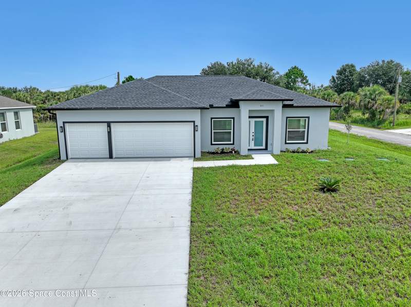 4 bedroom Single Family Residence at 601 Yardley Street, Port Malabar Unit 49, Palm Bay — photo 2
