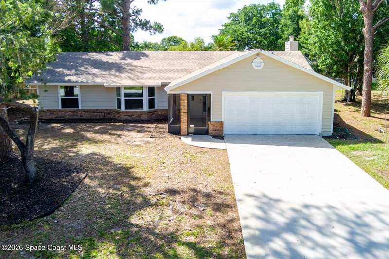 4 bedroom Single Family Residence at 271 Naylor Street, Port Malabar Unit 45, Palm Bay — photo 1