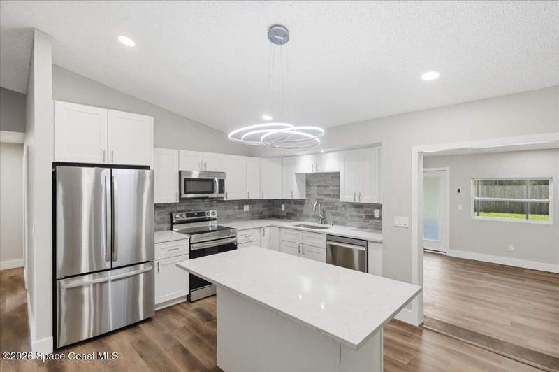 4 bedroom Single Family Residence at 271 Naylor Street, Port Malabar Unit 45, Palm Bay — photo 5