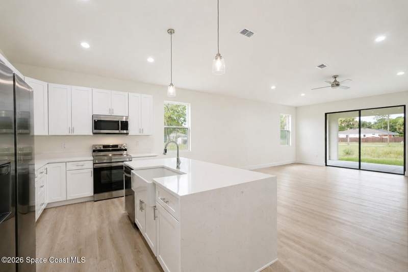 4 bedroom Single Family Residence at 460 Grenadier Avenue, Port Malabar Unit 14, Palm Bay — photo 4