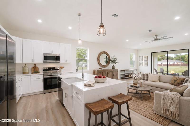 4 bedroom Single Family Residence at 460 Grenadier Avenue, Port Malabar Unit 14, Palm Bay — photo 5