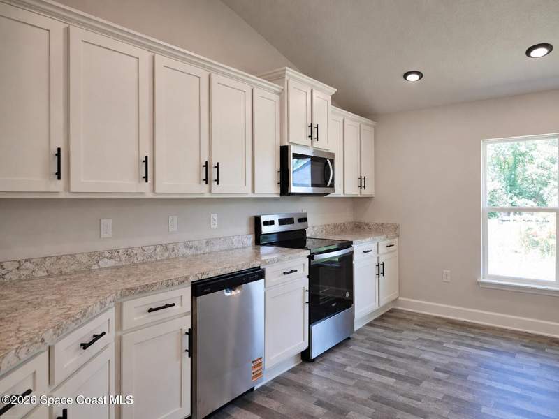 4 bedroom Single Family Residence at 403 J.a. Bombardier Boulevard, Port Malabar Unit 32, Palm Bay — photo 4
