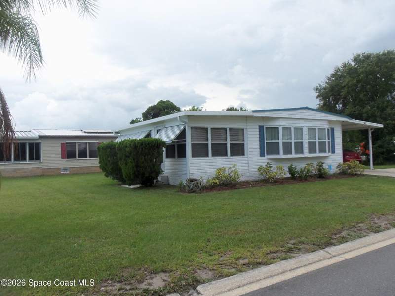 2 bedroom Manufactured Home at 346 Egret Circle, Barefoot Bay Unit 2 Part 11, Barefoot Bay — photo 1