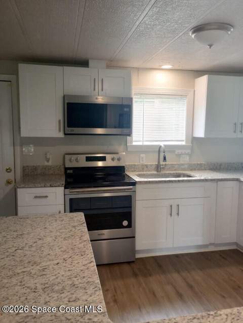 4889 Cambridge Drive, Mims FL - photo 7 of 16