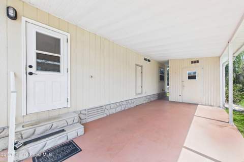 1020 Royal Palm Drive, Barefoot Bay FL - photo 10 of 82