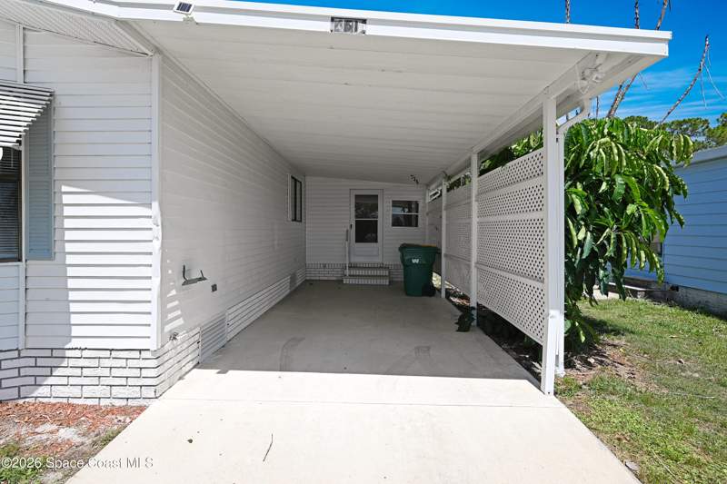 2 bedroom Manufactured Home at 451 E Egret Circle, Barefoot Bay Unit 2 Part 13, Barefoot Bay — photo 3