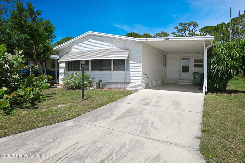 2 bedroom Manufactured Home at 451 E Egret Circle, Barefoot Bay Unit 2 Part 13, Barefoot Bay — photo 1