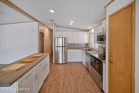 451 E Egret Circle, Barefoot Bay FL - photo 11 of 72