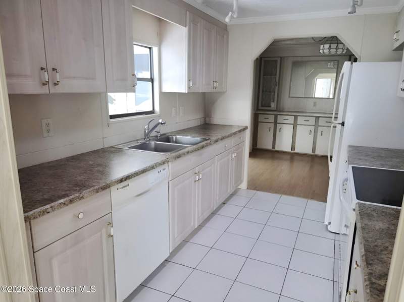 2 bedroom Mobile Home at 644 Wedelia Drive, Barefoot Bay Unit 2 Part 10, Barefoot Bay — photo 5