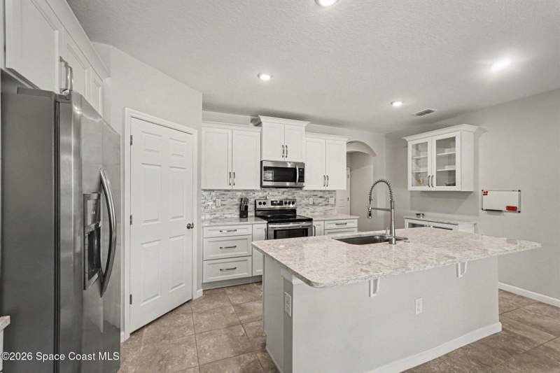 4 bedroom Single Family Residence at 730 Old Country Road, Preserves at Stonebriar Phase 1, Palm Bay — photo 3
