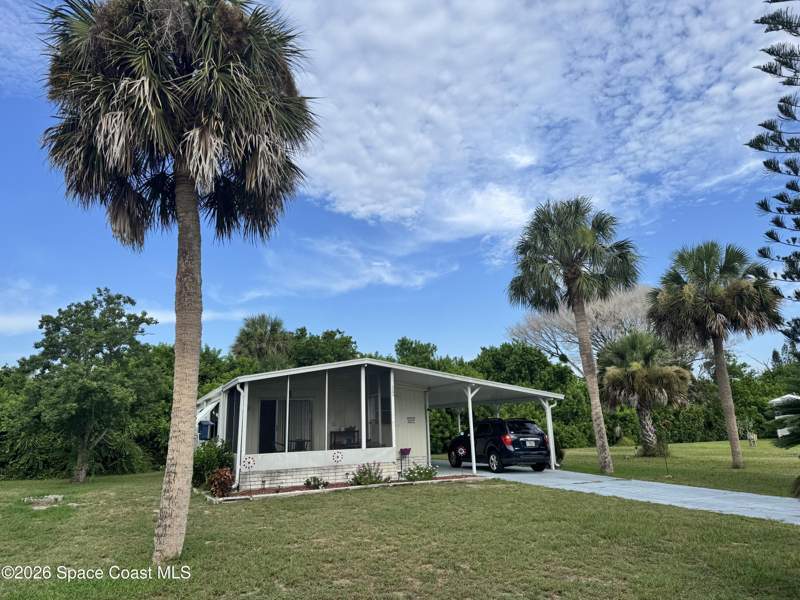 2 bedroom Manufactured Home at 7590 Blackhawk Road, Snug Harbor Village Sec 1, Micco — photo 2