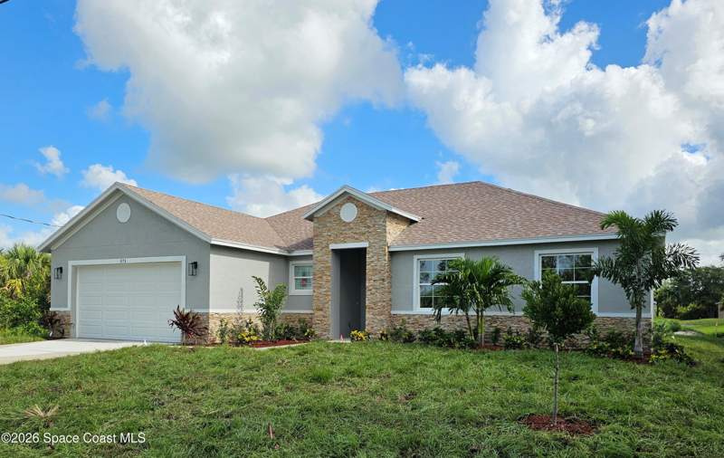 4 bedroom Single Family Residence at 571 Fondulac Street, Port Malabar Unit 30, Palm Bay — photo 2