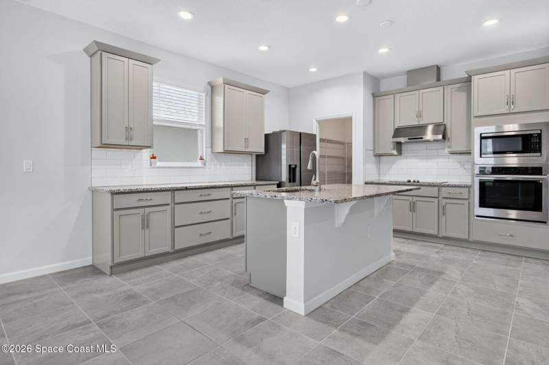 4 bedroom Single Family Residence at 1984 Middlebury Drive, Courtyards At Waterstone Ph I, Palm Bay — photo 4