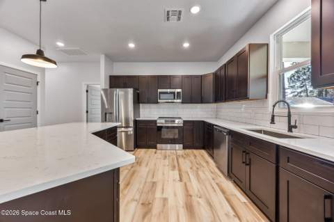 1254 Heitzman Avenue, Palm Bay FL - photo 9 of 24