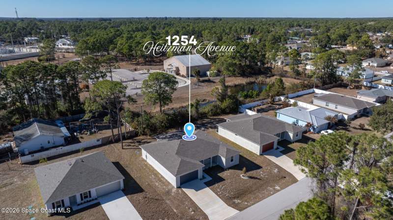4 bedroom Single Family Residence at 1254 Heitzman Avenue, Port Malabar Unit 32, Palm Bay — photo 2