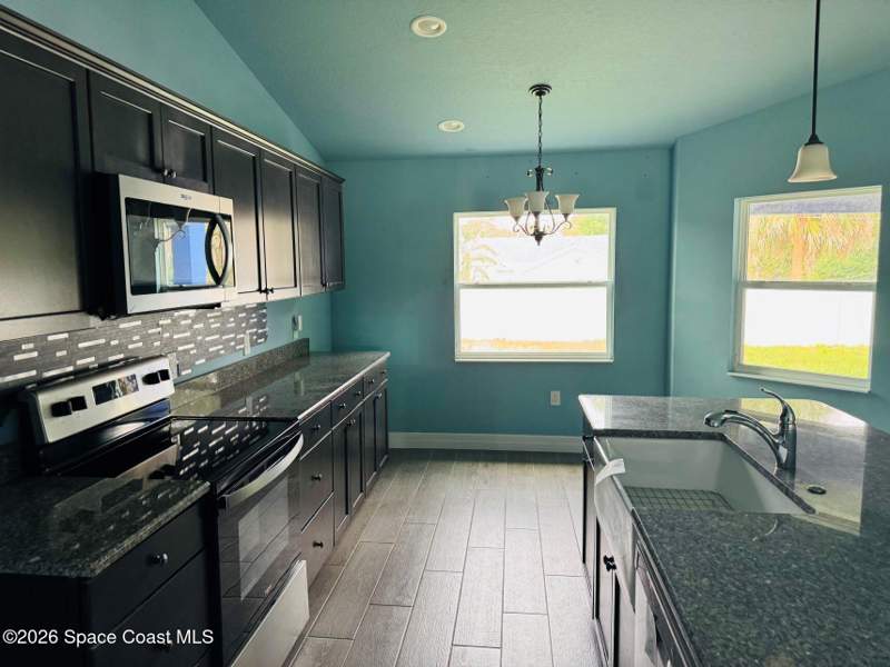 3 bedroom Single Family Residence at 419 Gantry Street, Port Malabar Unit 32, Palm Bay — photo 2