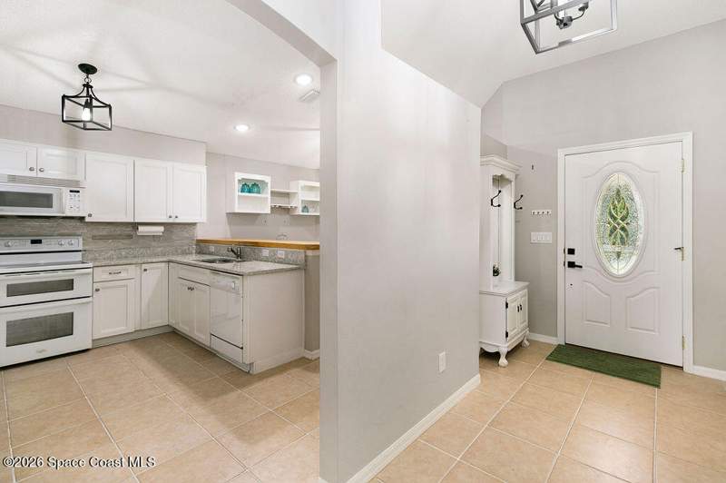 4 bedroom Single Family Residence at 4511 Derbyshire Drive, Hickory Green Unit 2, Titusville — photo 5