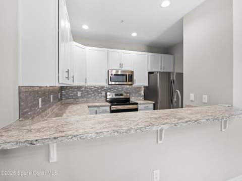 3931 Playa Del Sol Drive #104, Rockledge FL - photo 18 of 35