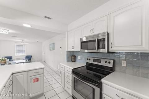 113 Holiday Lane, Cocoa Beach FL - photo 9 of 44