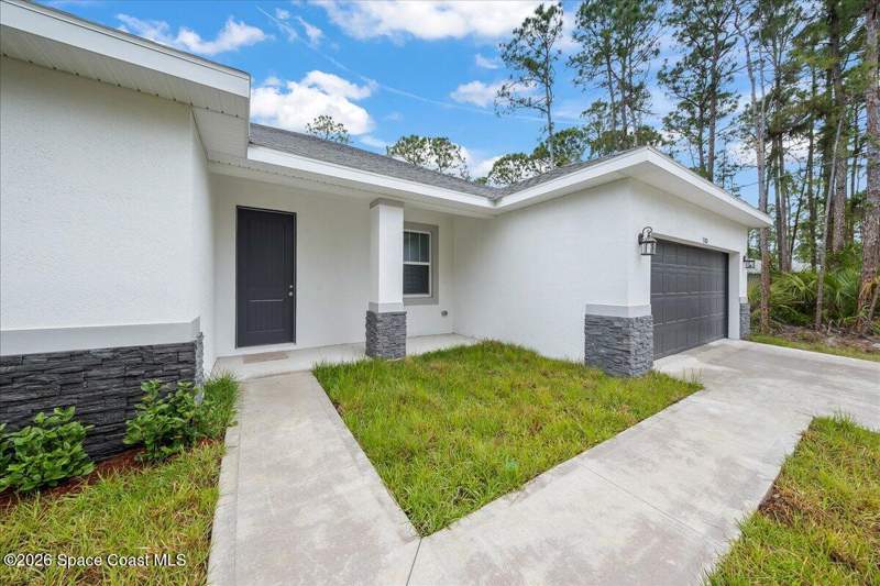 4 bedroom Single Family Residence at 3373 Fitzpatrick Avenue, Port Malabar Unit 30, Palm Bay — photo 2