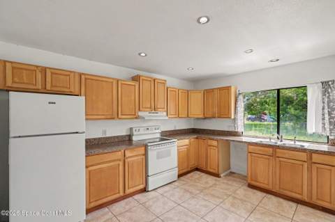 997 Mariposa Drive, Palm Bay FL - photo 10 of 33