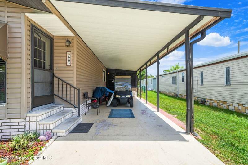 2 bedroom Manufactured Home at 602 N Dolphin Circle, Barefoot Bay Unit 1, Barefoot Bay — photo 3