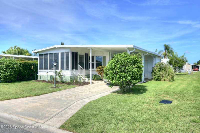 2 bedroom Manufactured Home at 912 Oriole Circle, Barefoot Bay Unit 2 Part 10, Barefoot Bay — photo 1