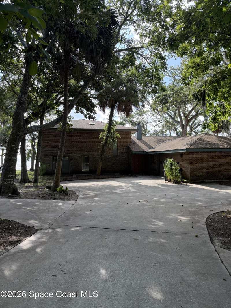 4 bedroom Single Family Residence at 6855 Riveredge Drive, Bellewood Plat No 2, Titusville — photo 1