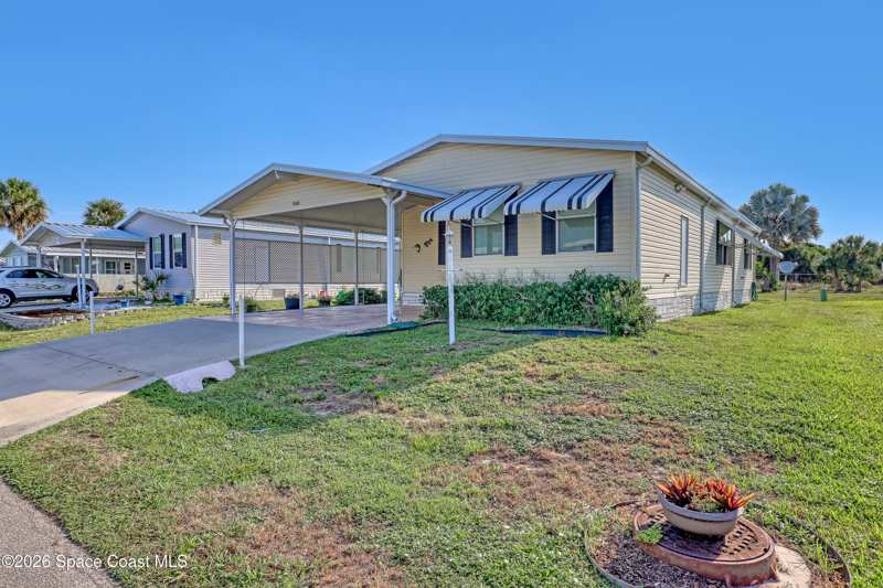 2 bedroom Manufactured Home at 7645 Cedar Bark Road, Snug Harbor Lakes Condo, Micco — photo 1
