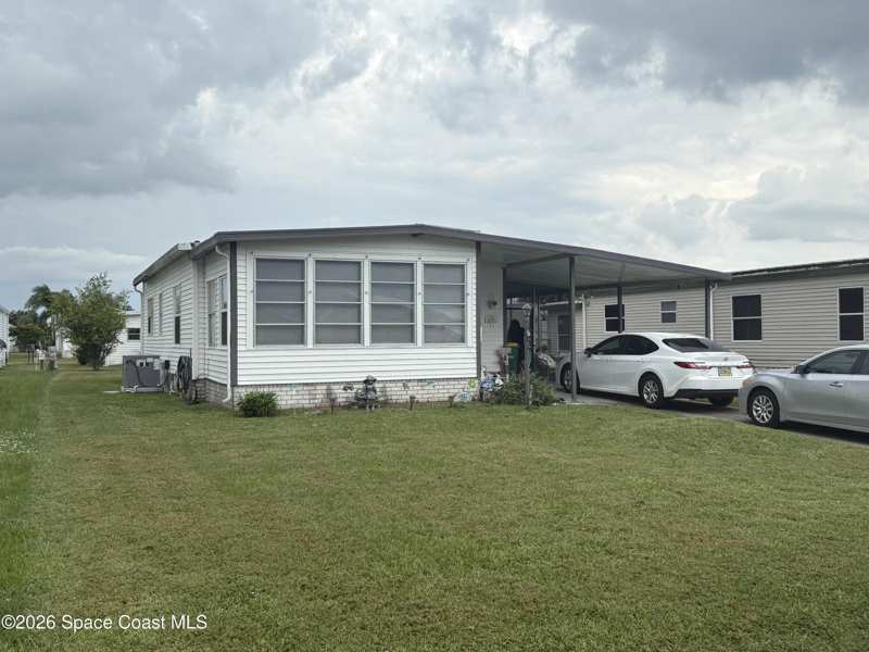 2 bedroom Manufactured Home at 1153 Waterway Drive, Barefoot Bay Unit 2 Part 10, Barefoot Bay — photo 1
