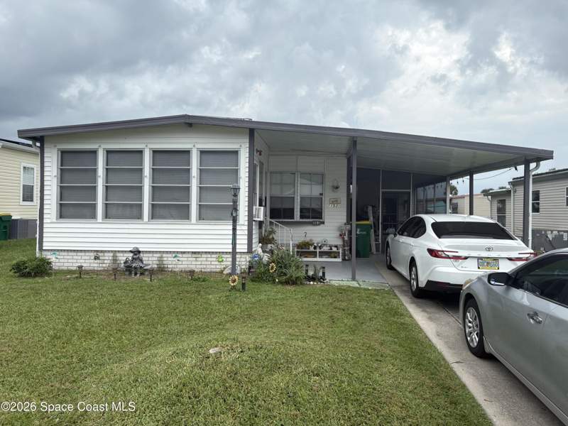 2 bedroom Manufactured Home at 1153 Waterway Drive, Barefoot Bay Unit 2 Part 10, Barefoot Bay — photo 2
