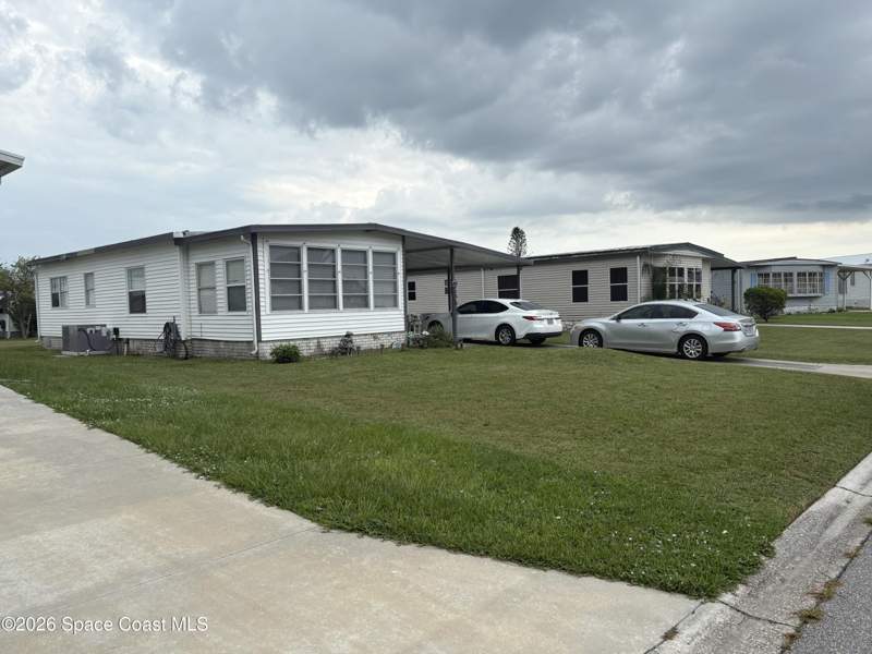 2 bedroom Manufactured Home at 1153 Waterway Drive, Barefoot Bay Unit 2 Part 10, Barefoot Bay — photo 3