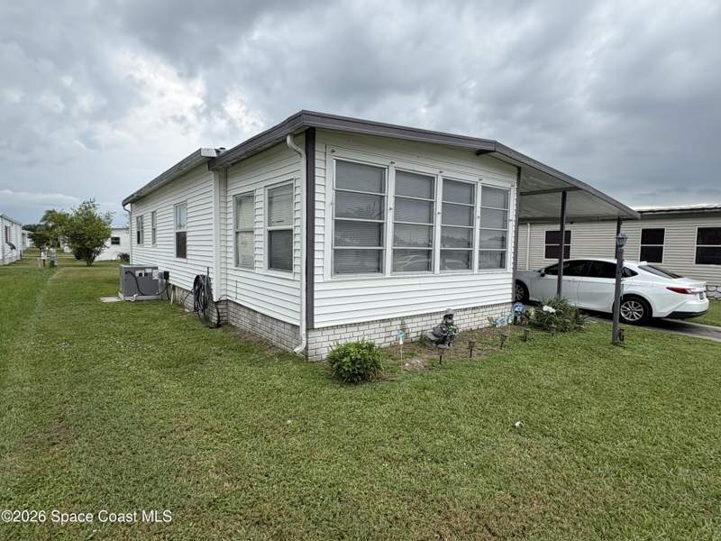 2 bedroom Manufactured Home at 1153 Waterway Drive, Barefoot Bay Unit 2 Part 10, Barefoot Bay — photo 4
