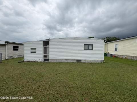 1153 Waterway Drive, Barefoot Bay FL - photo 11 of 59