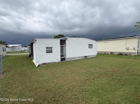 1153 Waterway Drive, Barefoot Bay FL - photo 12 of 59