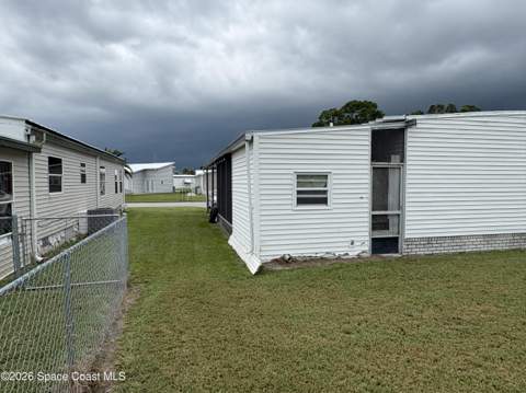 1153 Waterway Drive, Barefoot Bay FL - photo 13 of 59