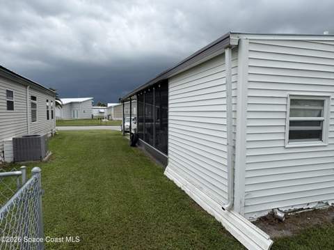 1153 Waterway Drive, Barefoot Bay FL - photo 14 of 59