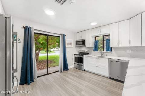 8759 Banyan Way, Cape Canaveral FL - photo 6 of 48