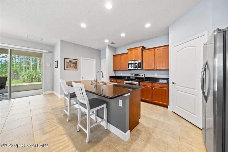 3 bedroom Single Family Residence at 745 Remington Green Drive, Fairway Crossings at Bayside Lakes, Palm Bay — photo 2