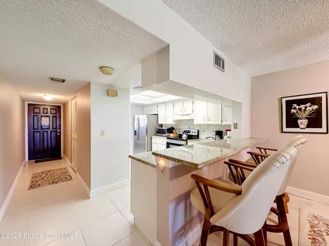 840 N Atlantic Avenue #C103, Cocoa Beach FL - photo 11 of 31
