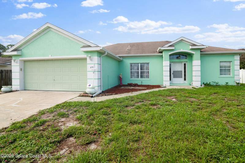 3 bedroom Single Family Residence at 698 Thuringer Street, Port Malabar Unit 48, Palm Bay — photo 2