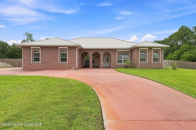 8605 Lake Ridge Drive, home for sale in Palm Bay