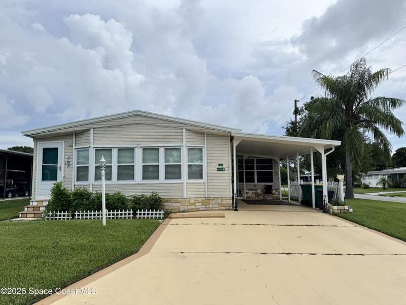 2 bedroom Manufactured Home at 600 N Dolphin Circle, Barefoot Bay Unit 1, Barefoot Bay — photo 1