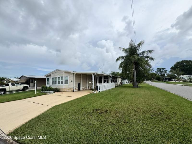 2 bedroom Manufactured Home at 600 N Dolphin Circle, Barefoot Bay Unit 1, Barefoot Bay — photo 4